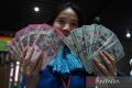 Rupiah pada Senin pagi menguat jadi Rp17.696 per dolar AS